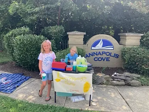 Kids running a lemonade stand in the neighborhood